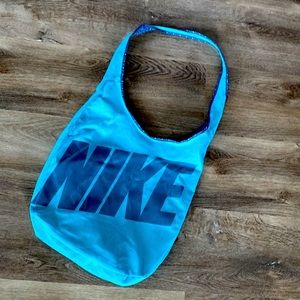 Nike mesh sling shoulder bag.